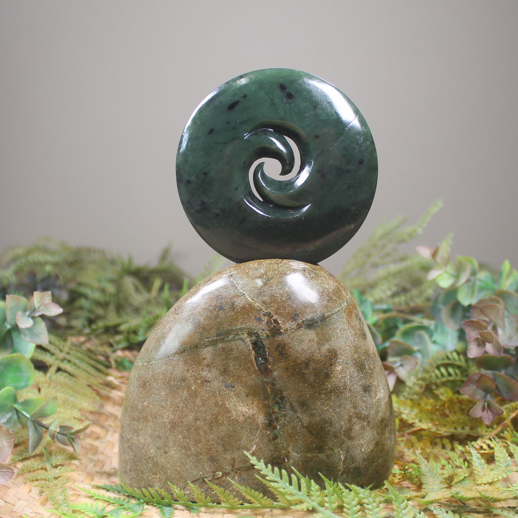 Koru sculpture carved from Rimu Pounamu - NZ Greenstone