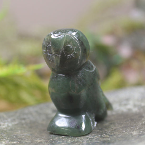 Pounamu owl sculpture