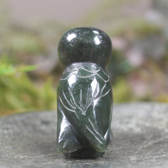 Pounamu owl sculpture