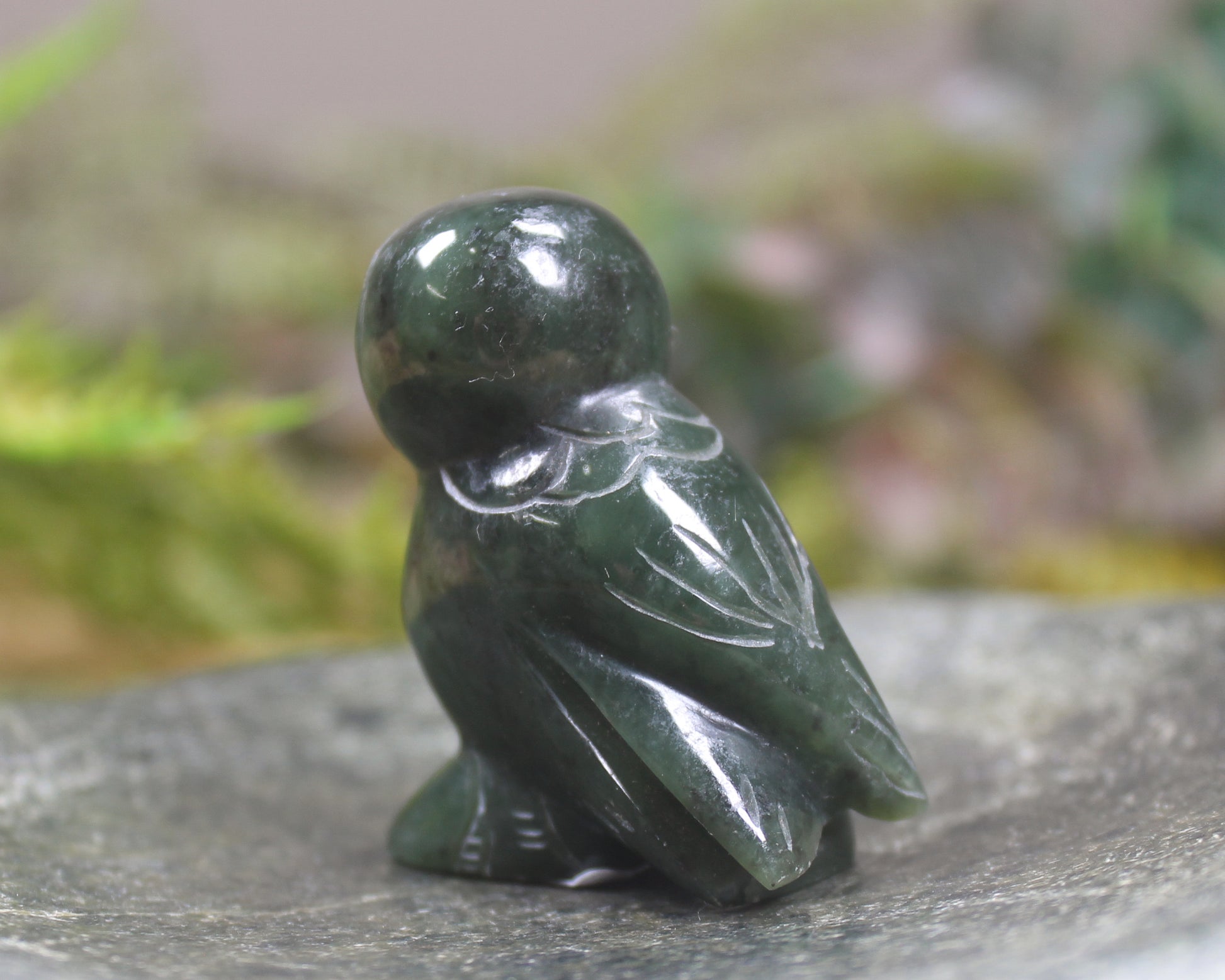 Pounamu owl sculpture