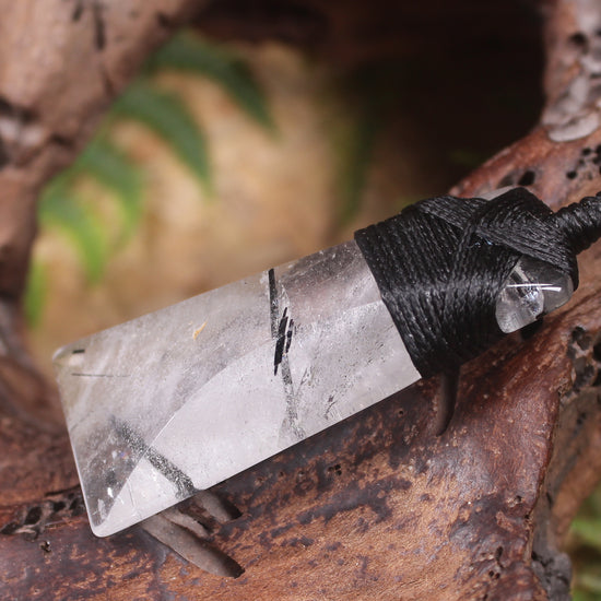 Quartz with Black Tourmaline carved into a Toki or Adze