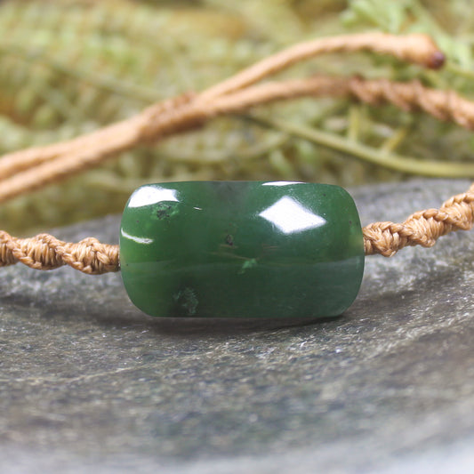 Adjustable cord bracelet with Hapopo Pounamu