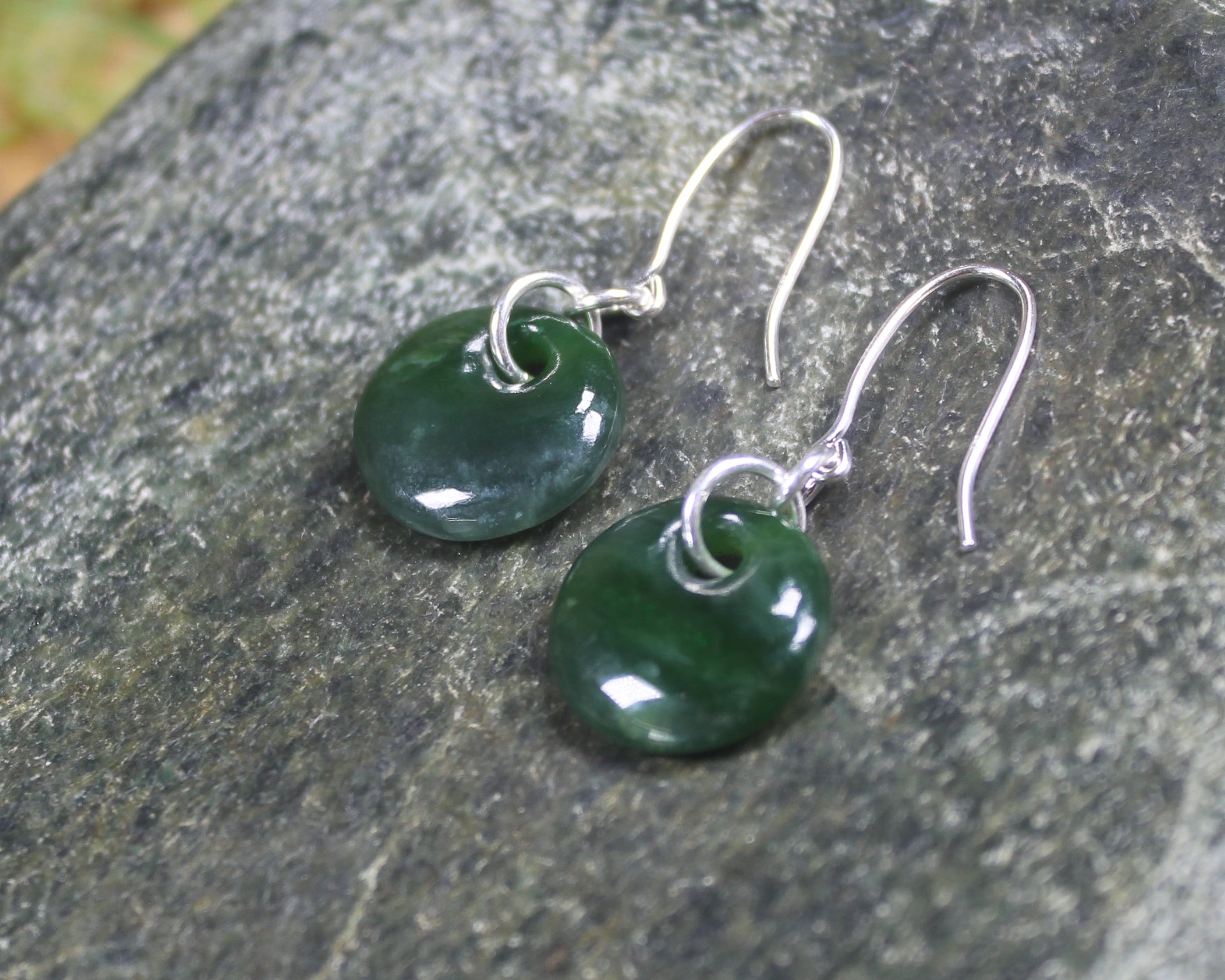 Porowhita Earrings carved from Kawakawa Pounamu - NZ Greenstone