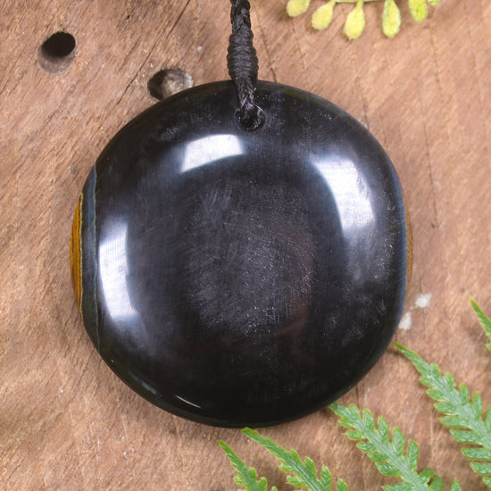 Porowhita carved from Blue Tigers Eye
