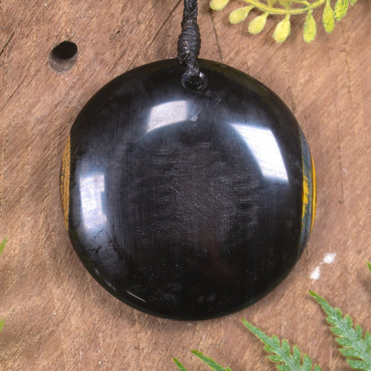 Porowhita carved from Blue Tigers Eye
