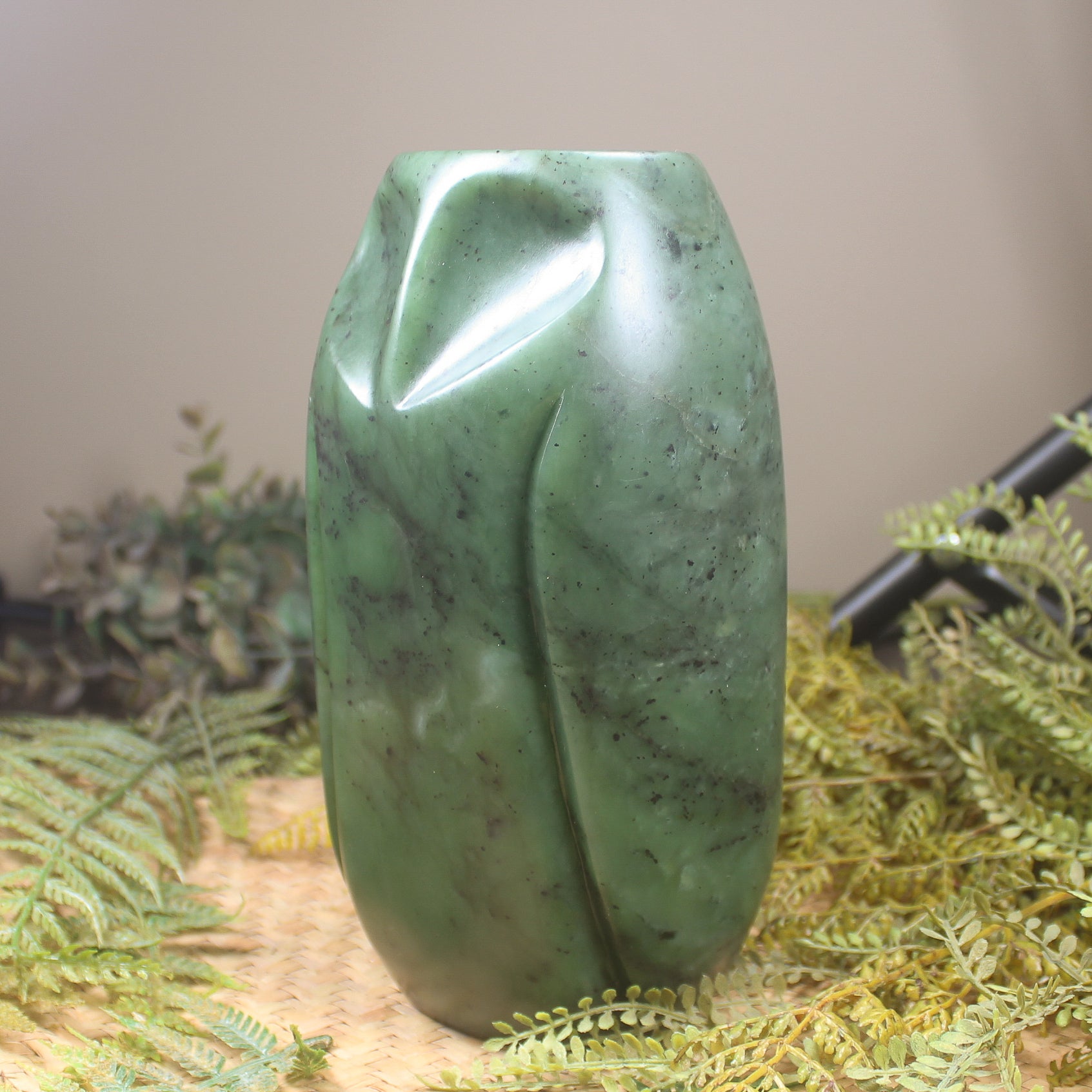 Pounamu owl sculpture