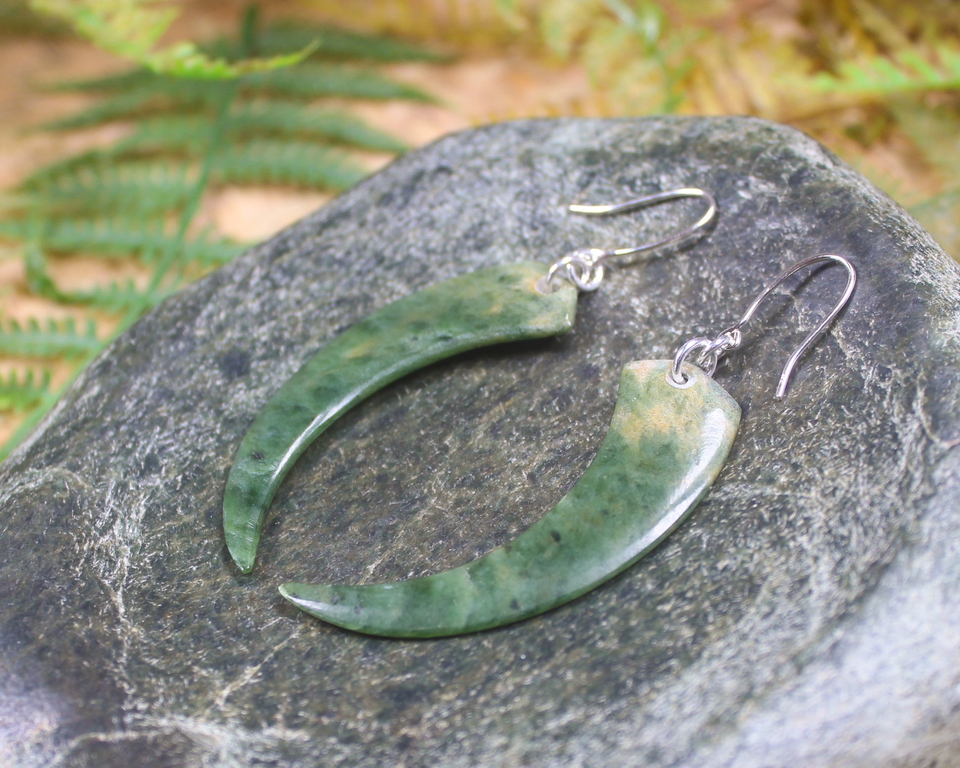 Huia Beak earrings carved from Flower Jade Pounamu - NZ Greenstone