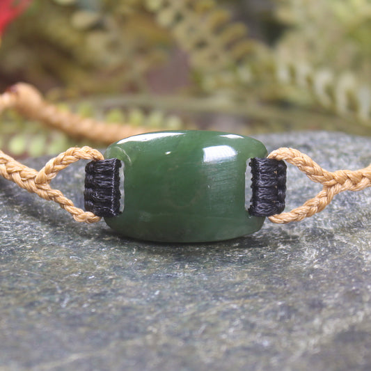 Adjustable cord bracelet with Kawakawa Pounamu