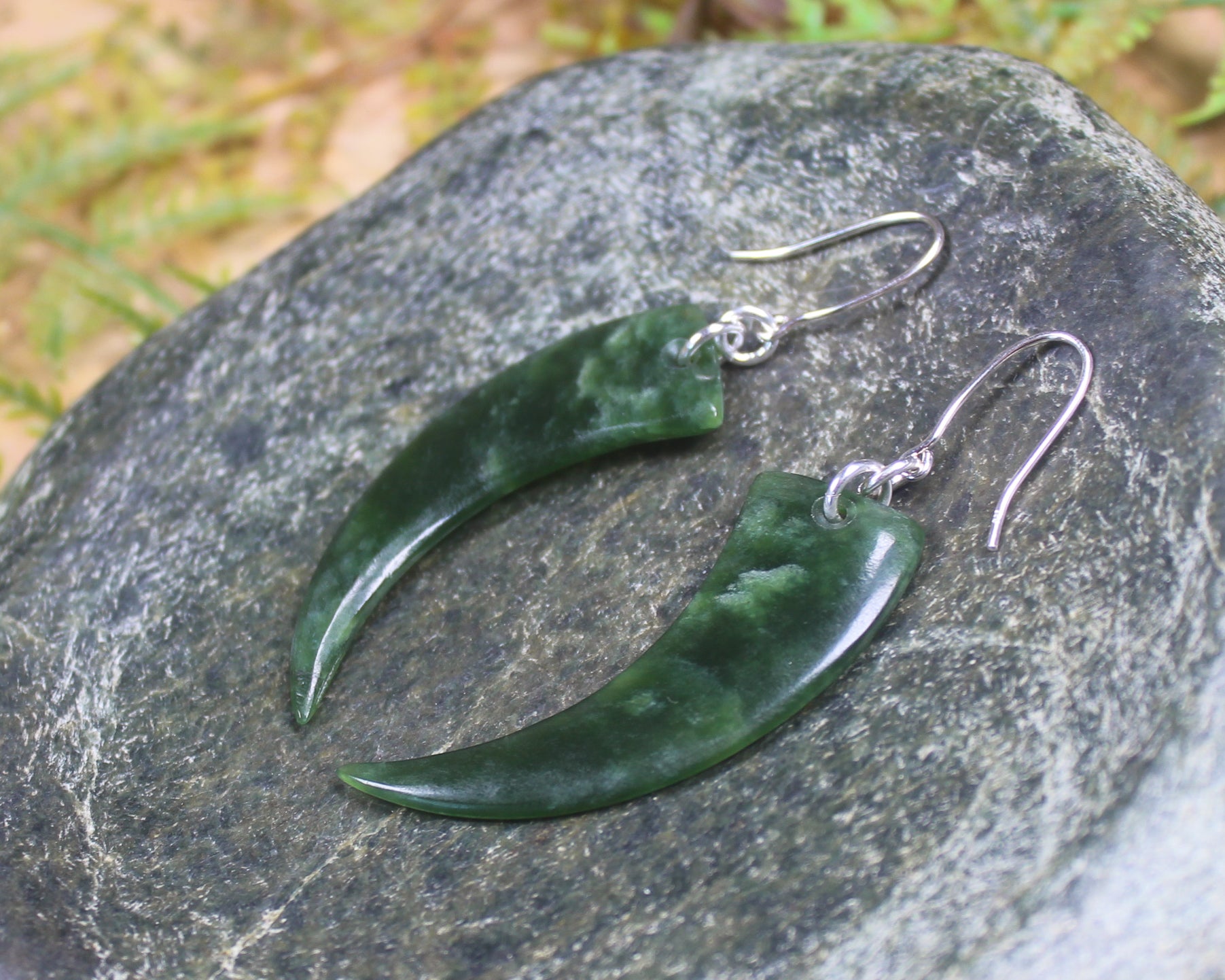 Huia Beak earrings carved from Kawakawa Pounamu - NZ Greenstone