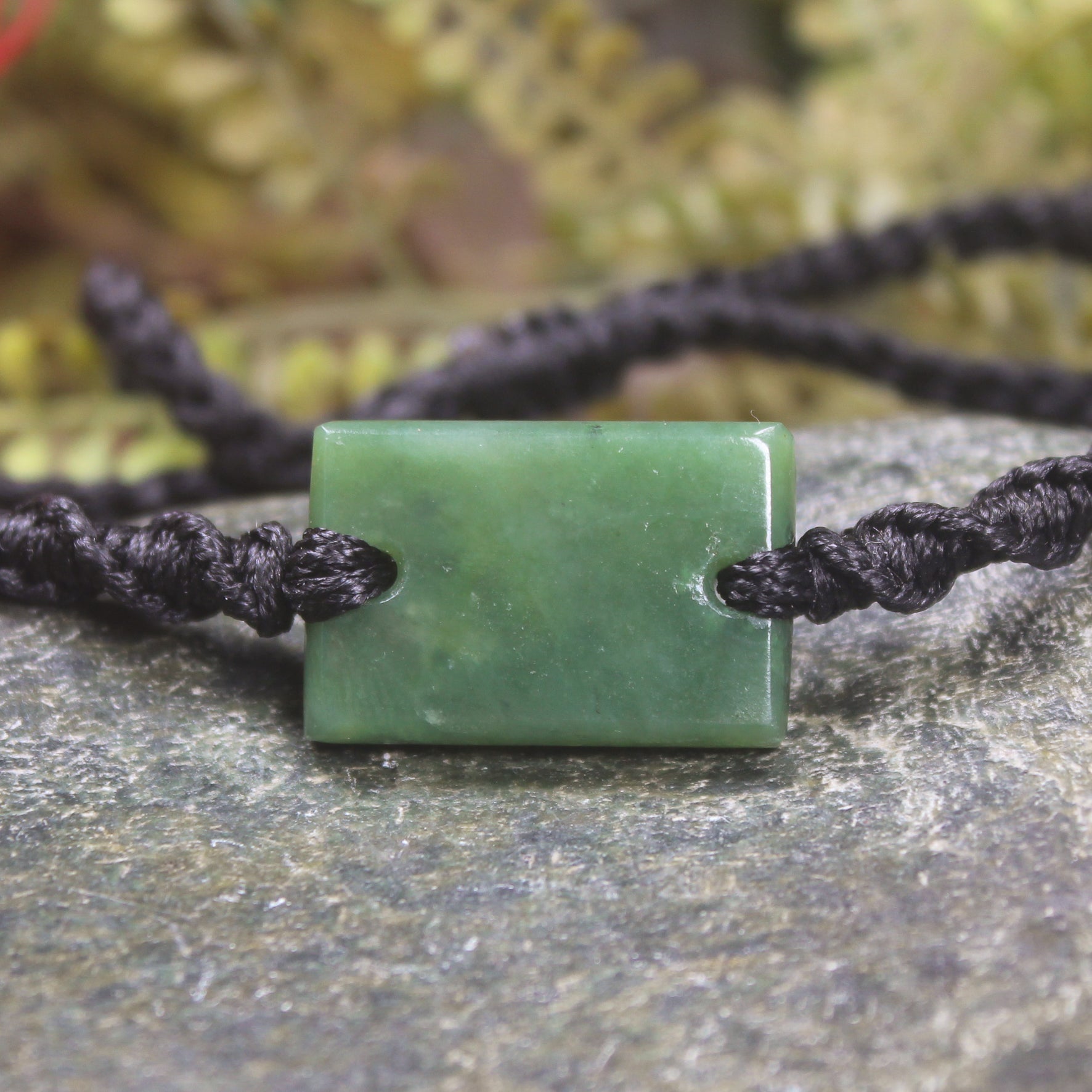 Adjustable cord bracelet with Hapopo Pounamu