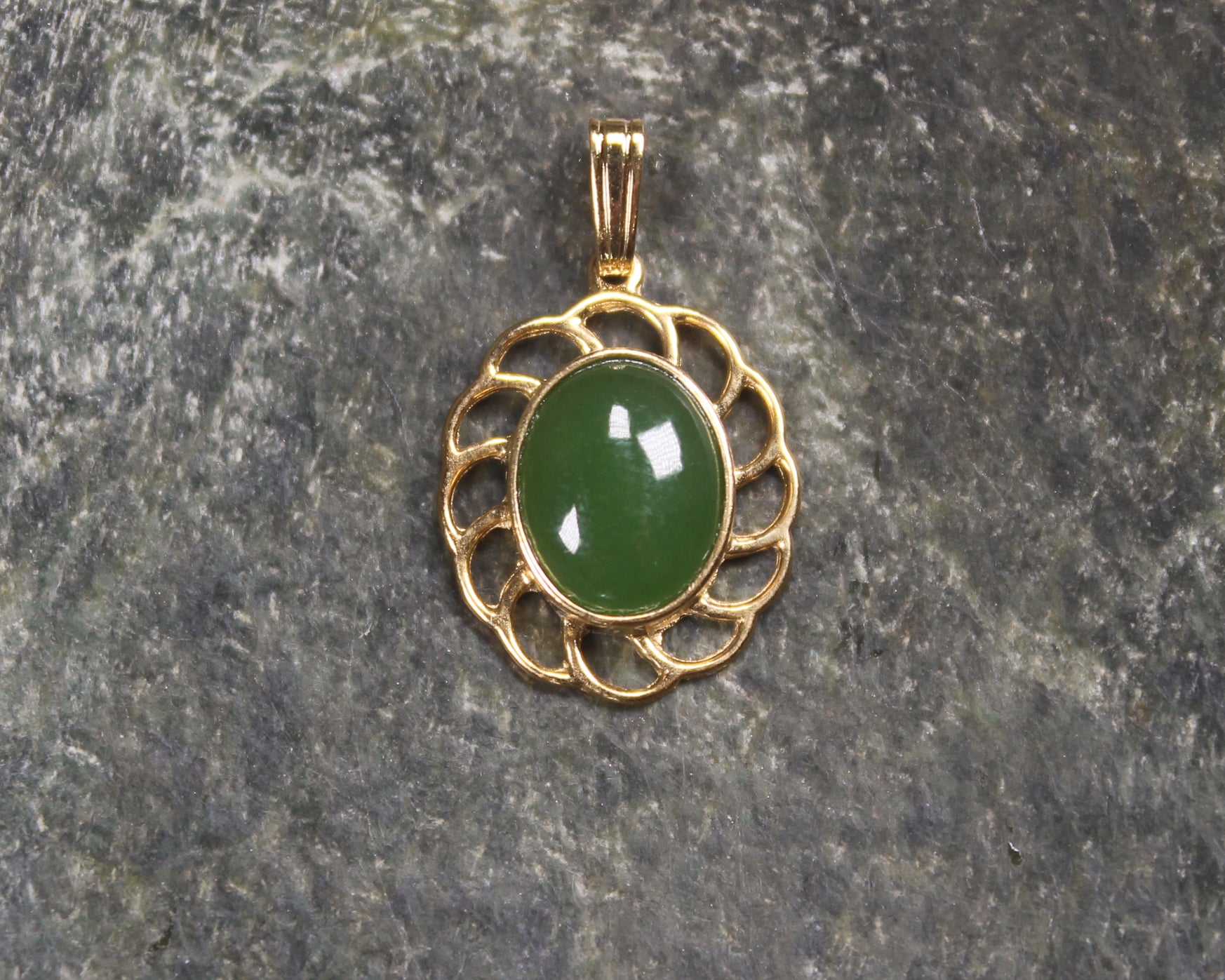Kawakawa Pounamu pendant with a gold plated setting - NZ Greenstone