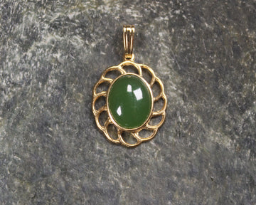 Kawakawa Pounamu pendant with a gold plated setting - NZ Greenstone