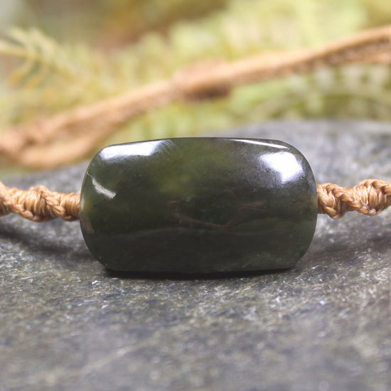 Adjustable cord bracelet with Rimu Pounamu