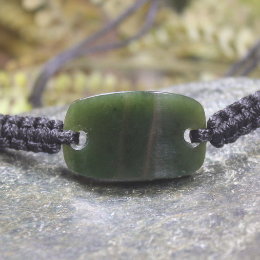 Adjustable cord bracelet with Kawakawa Pounamu