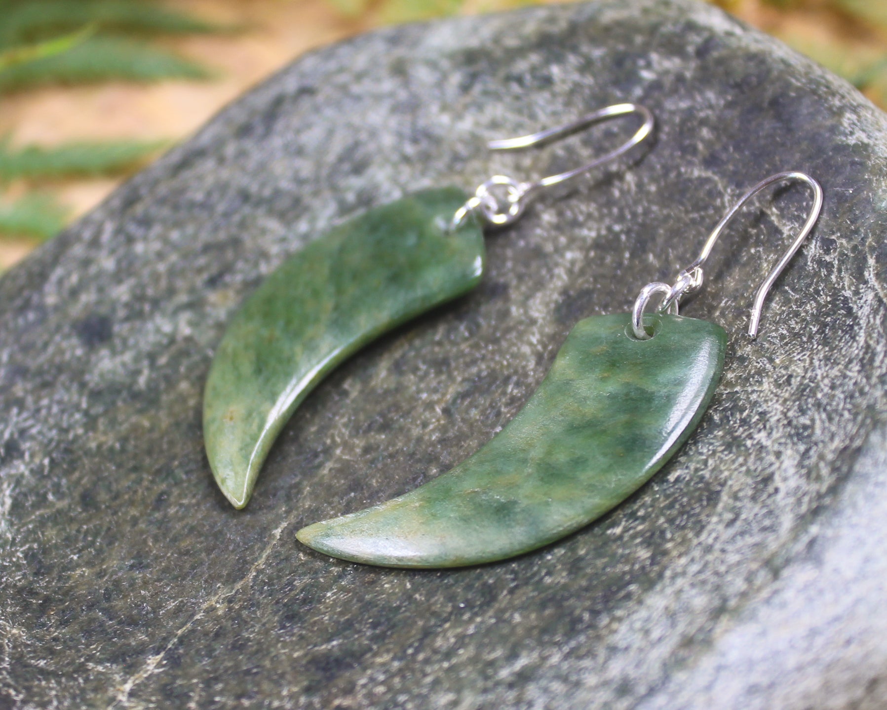 Huia Beak earrings carved from Flower Jade Pounamu - NZ Greenstone