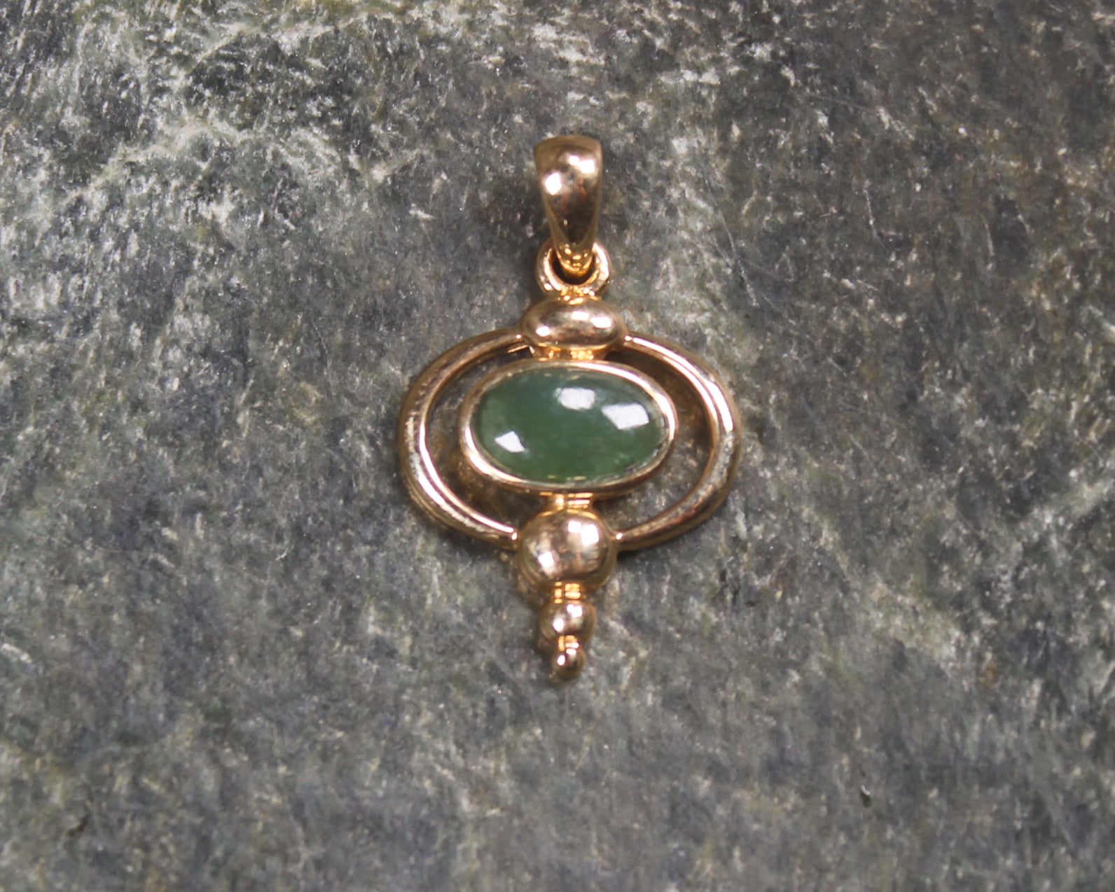 Kawakawa Pounamu pendant with a gold plated setting - NZ Greenstone