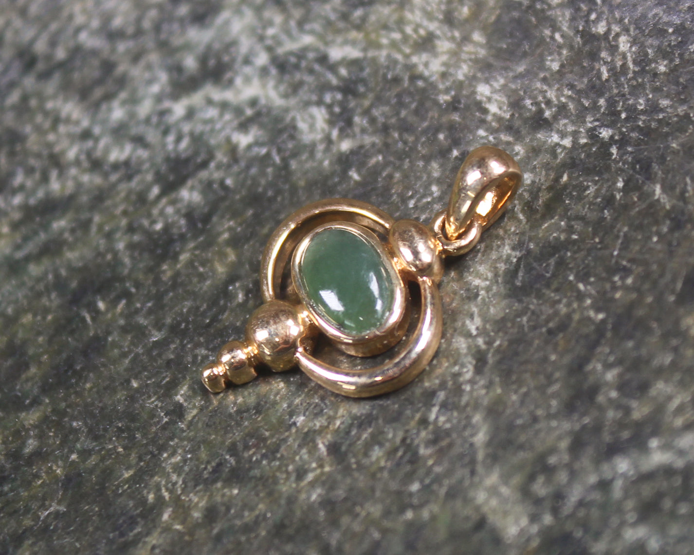Kawakawa Pounamu pendant with a gold plated setting - NZ Greenstone
