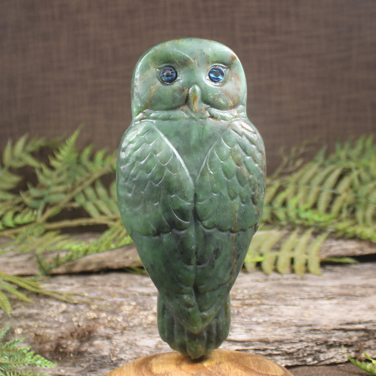 Pounamu owl sculpture