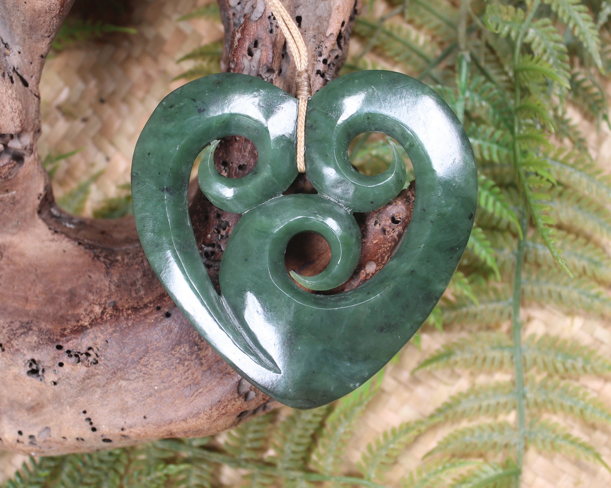 Heart with Koru carved from Hapopo Pounamu - NZ Greenstone