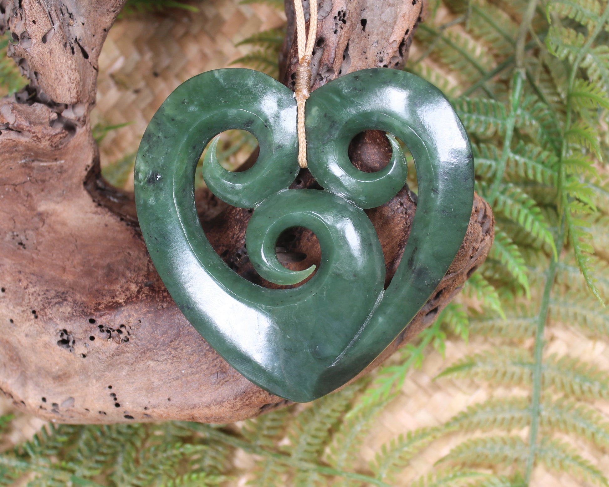 Heart with Koru carved from Hapopo Pounamu - NZ Greenstone