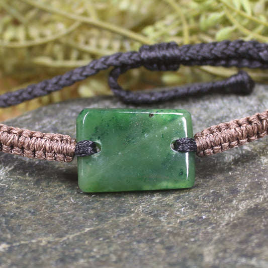 Adjustable cord bracelet with Kawakawa Pounamu