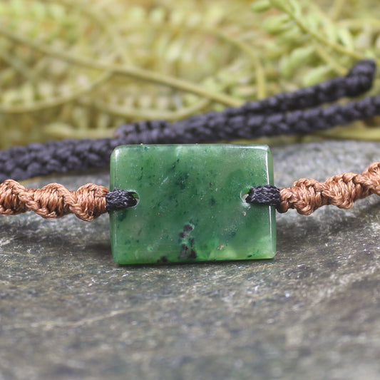 Adjustable cord bracelet with Kawakawa Pounamu