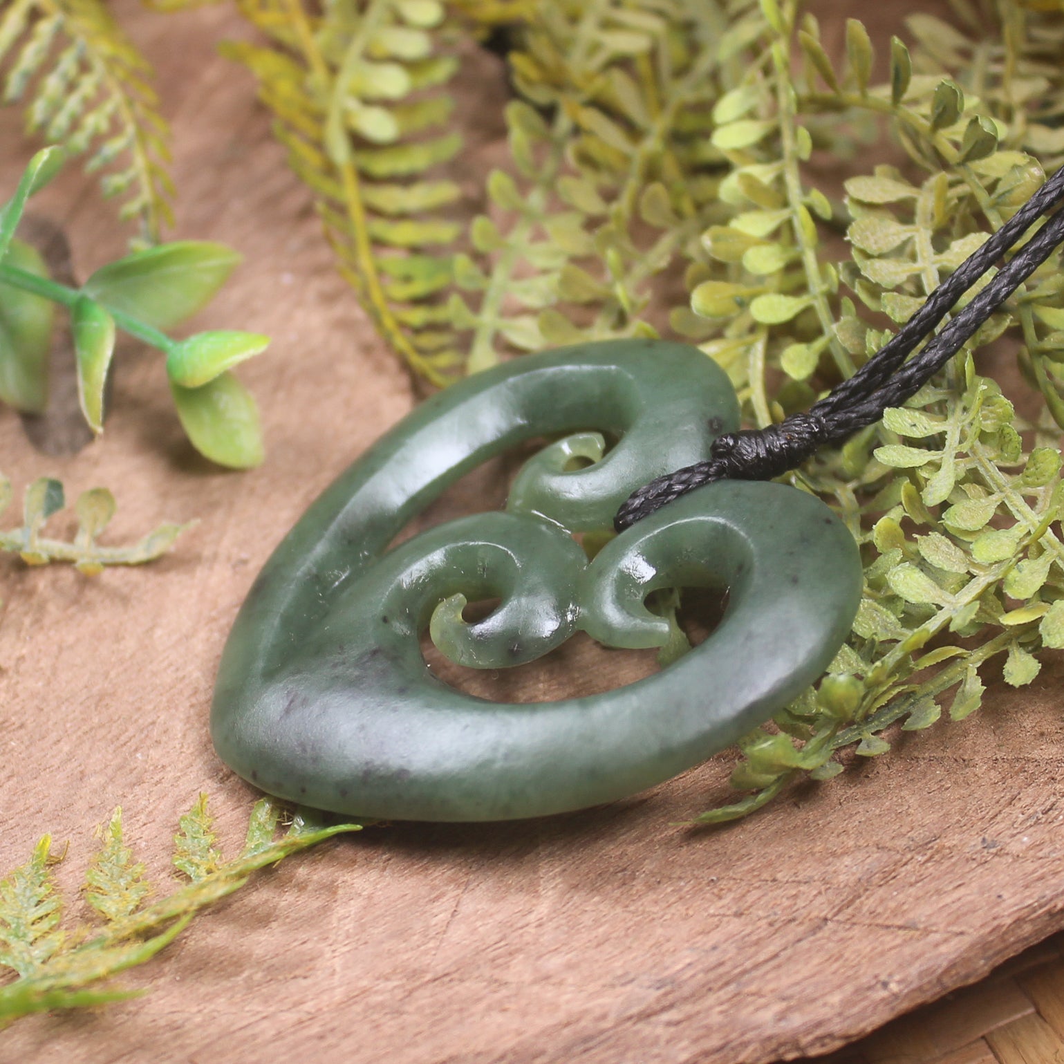 Heart with Koru carved from Hapopo Pounamu - NZ Greenstone
