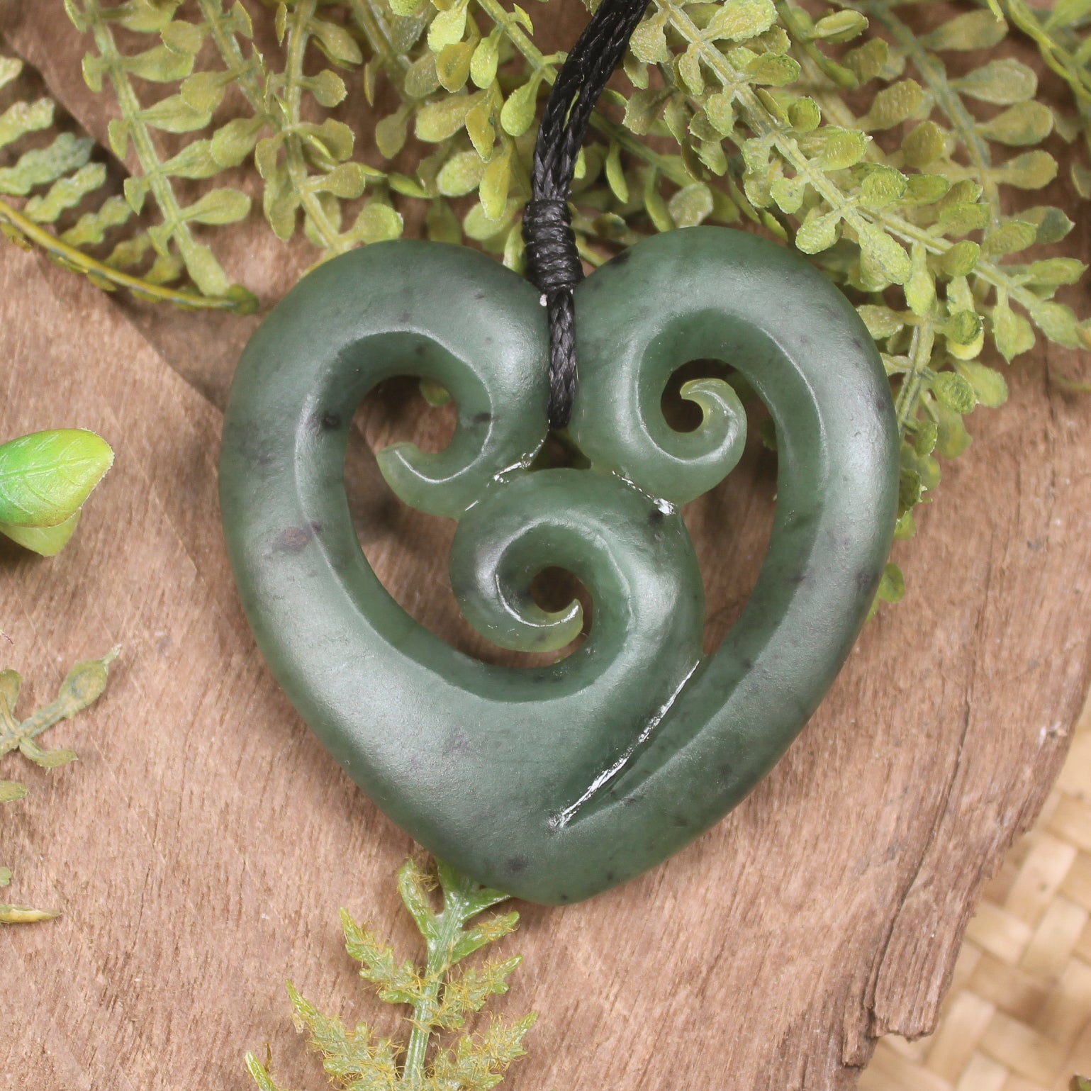Heart with Koru carved from Hapopo Pounamu - NZ Greenstone