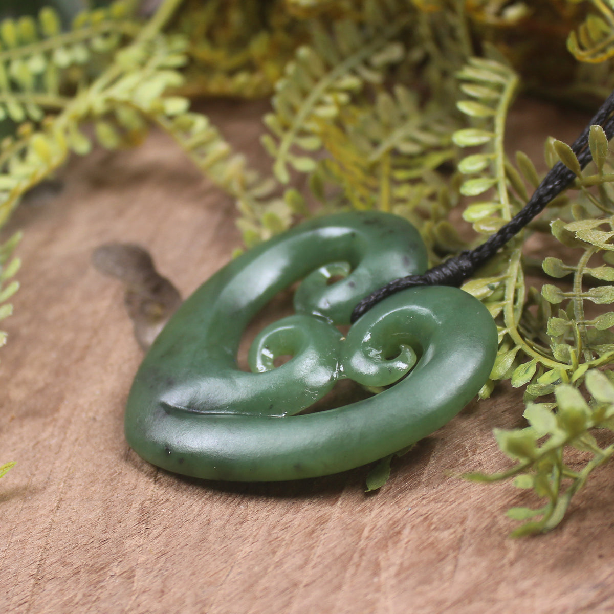 Heart with Koru carved from Hapopo Pounamu - NZ Greenstone