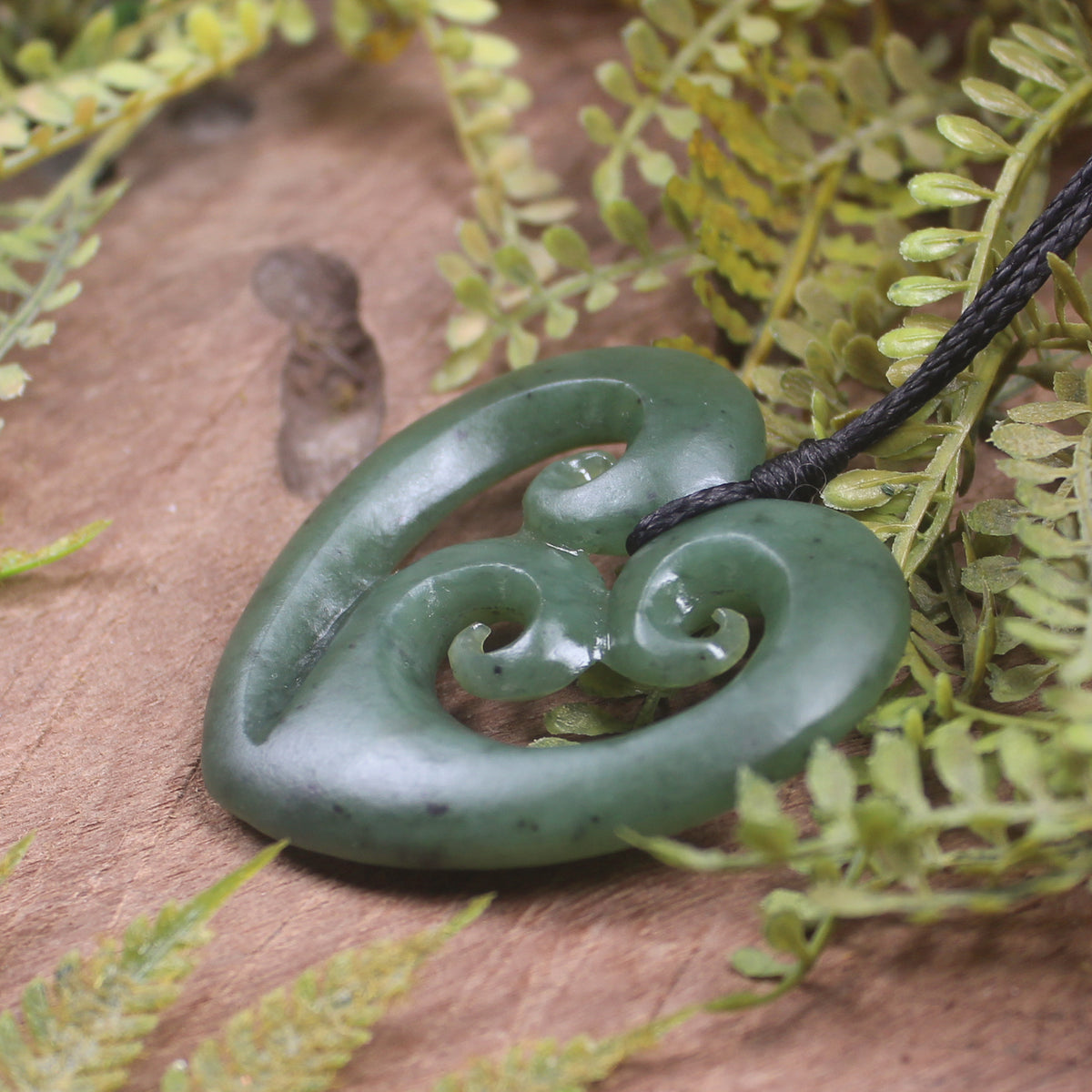 Heart with Koru carved from Hapopo Pounamu - NZ Greenstone