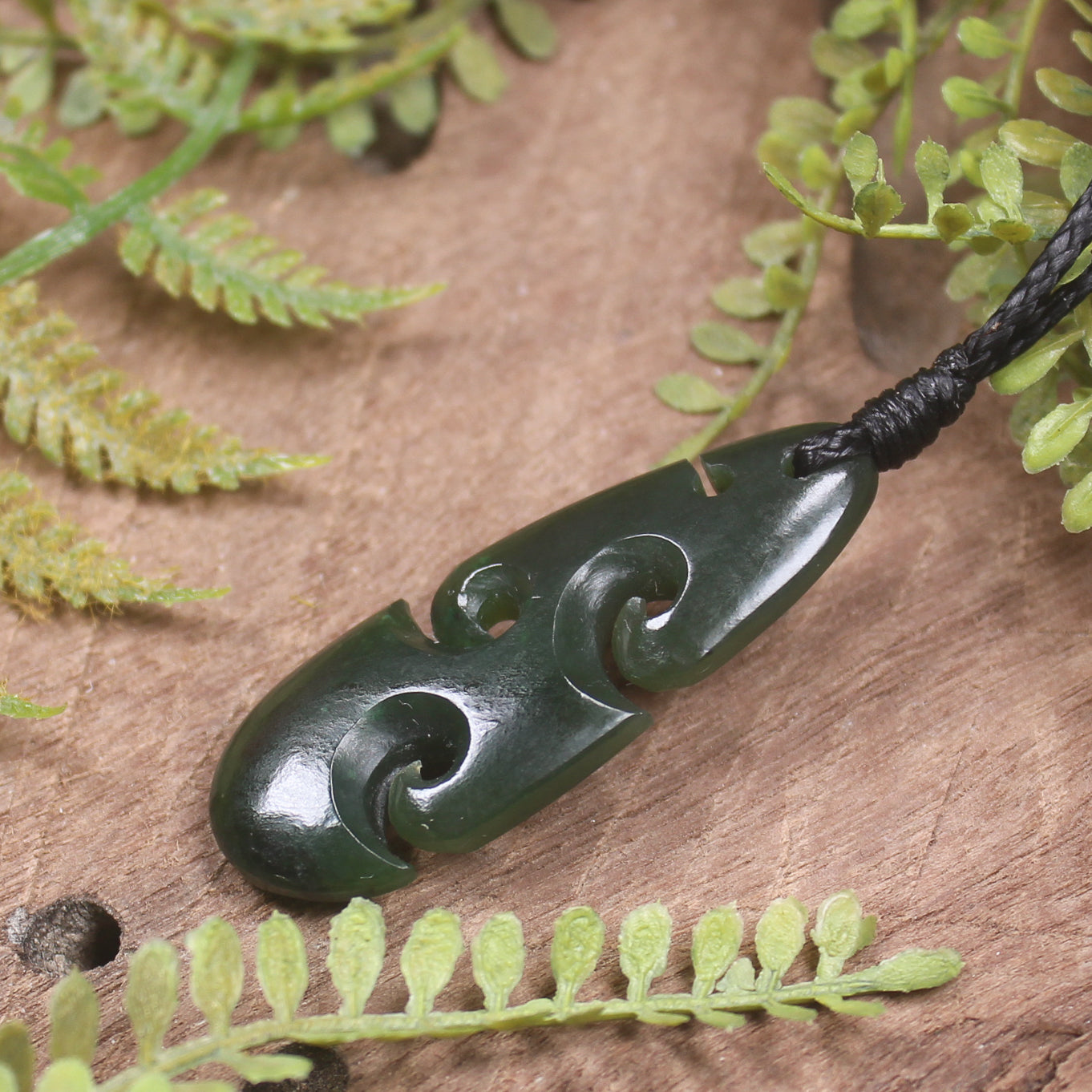 Roimata or Teardop with Koru carved from Rimu Pounamu - NZ Greenstone