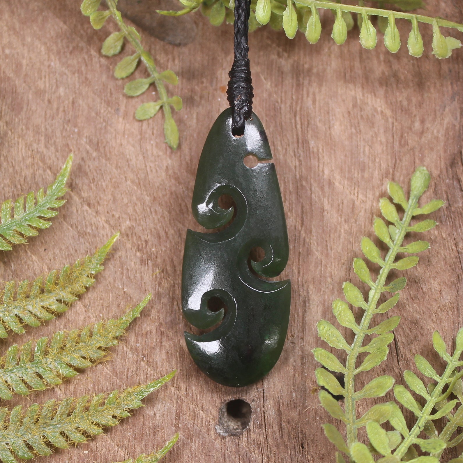 Roimata or Teardop with Koru carved from Rimu Pounamu - NZ Greenstone