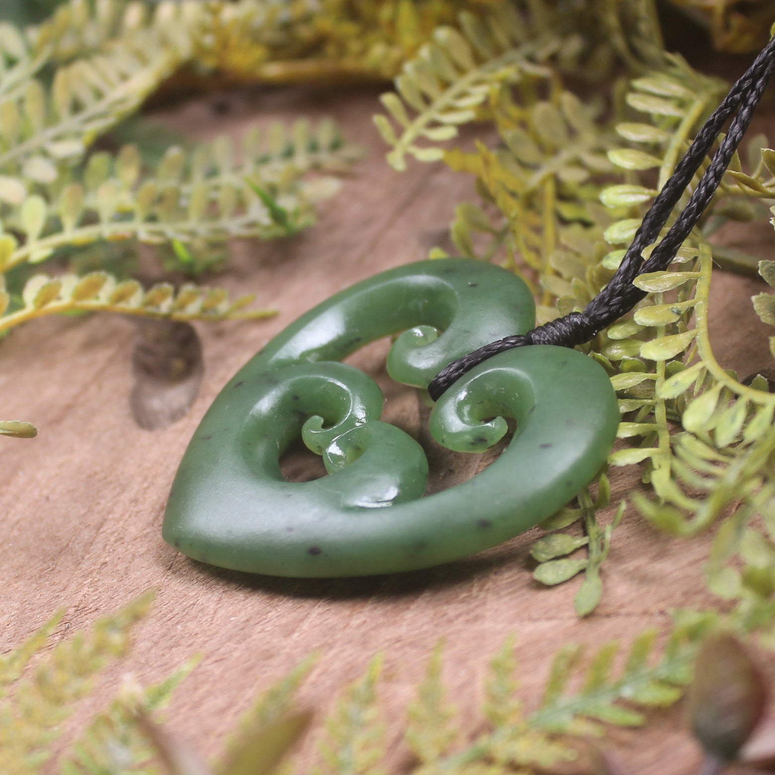 Heart with Koru carved from Hapopo Pounamu - NZ Greenstone