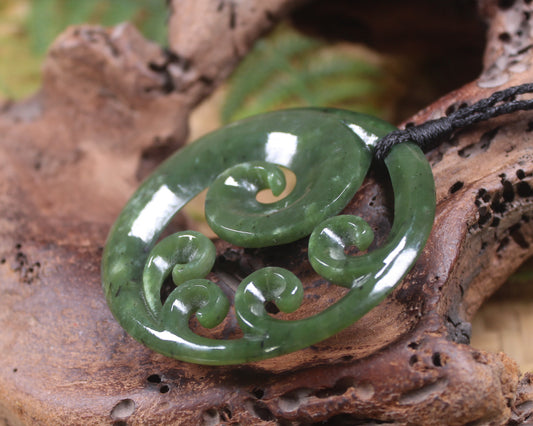 Koru carved from Rimu Pounamu - NZ Greenstone