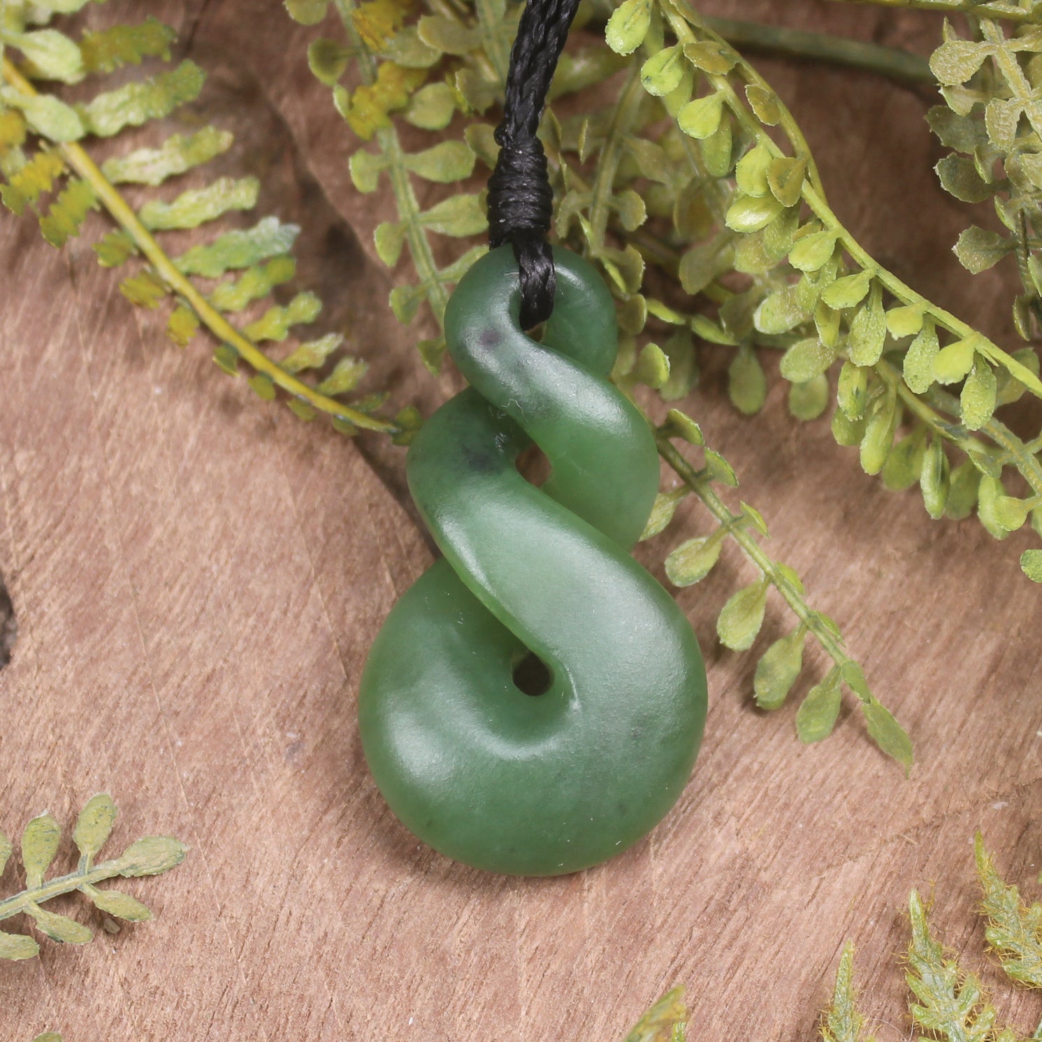 Twist or Pikorua carved from Hapopo Pounamu - NZ Greenstone