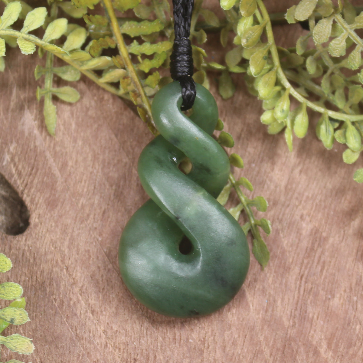 Twist or Pikorua carved from Hapopo Pounamu - NZ Greenstone