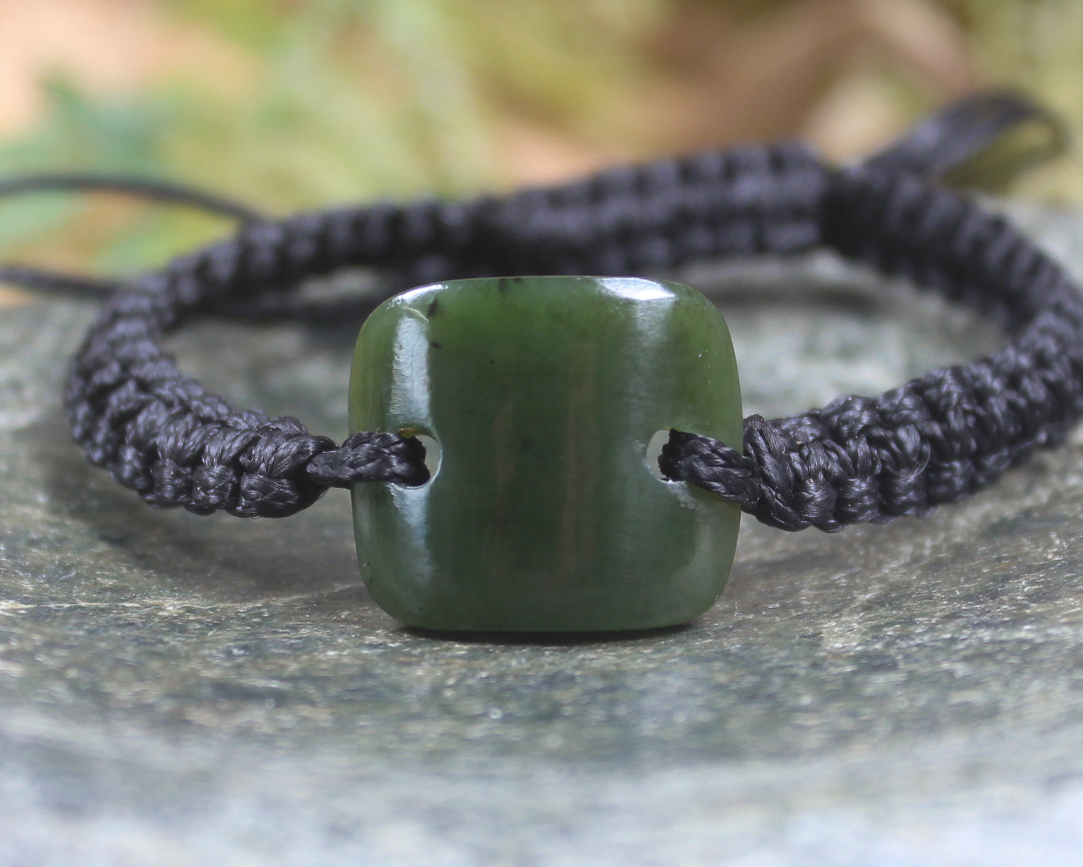 Adjustable cord bracelet with Rimu Pounamu