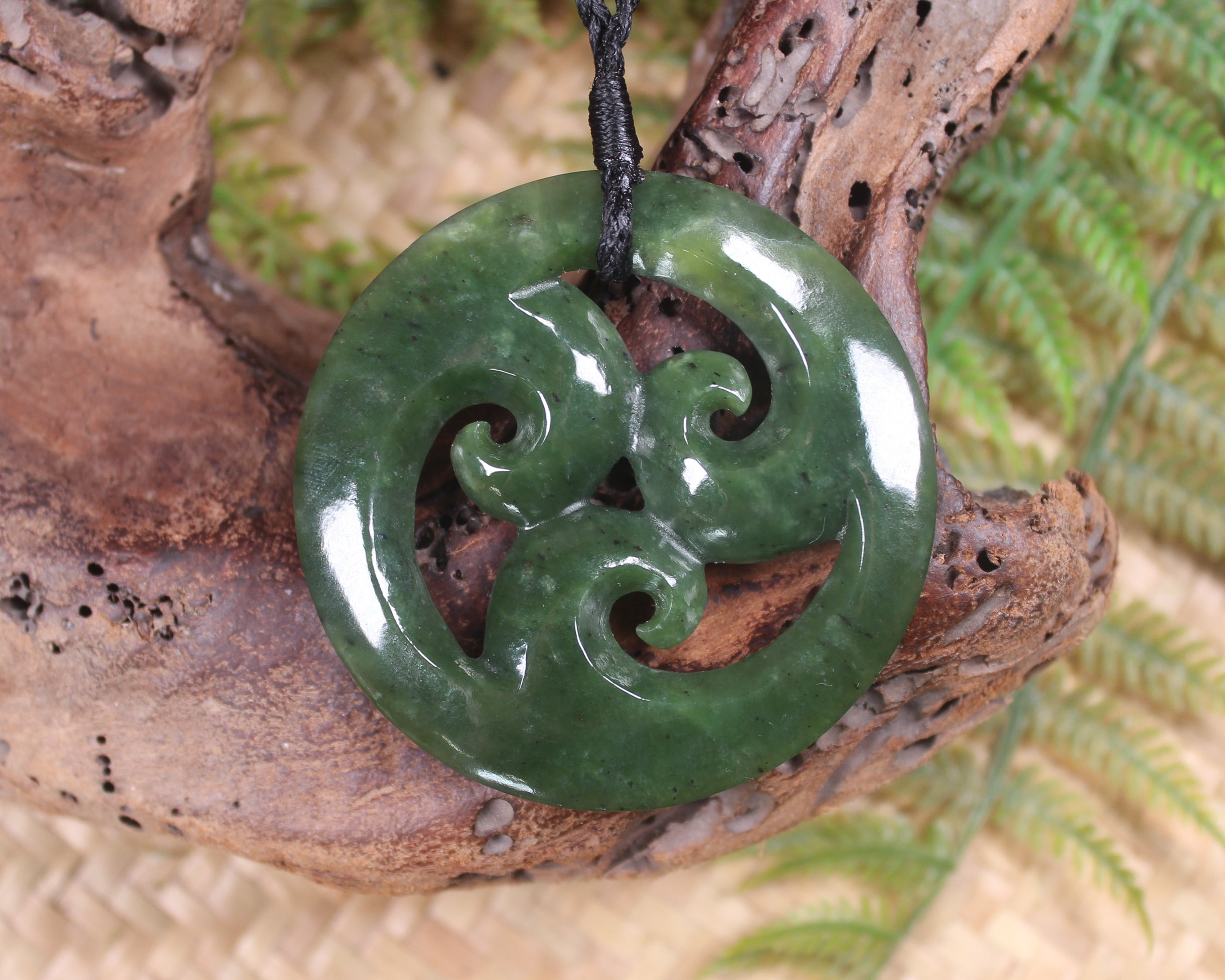 Koru carved from Rimu Pounamu - NZ Greenstone