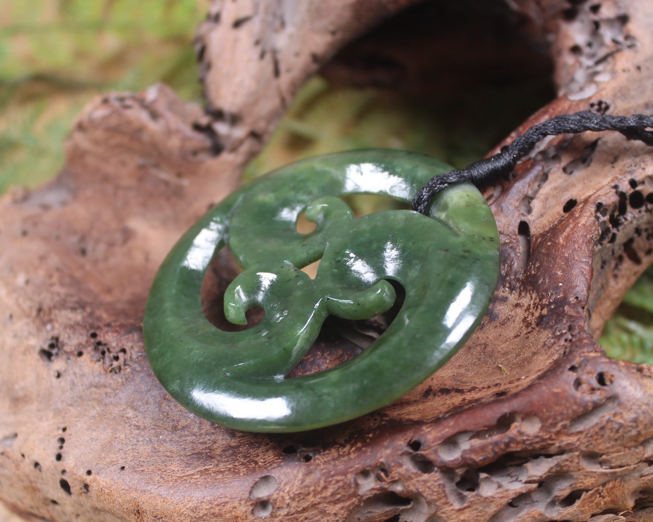 Koru carved from Rimu Pounamu - NZ Greenstone