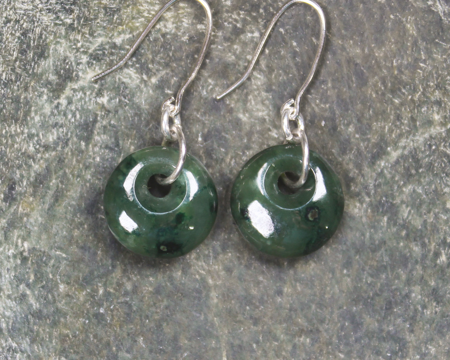 Porowhita Earrings carved from Kawakawa Pounamu - NZ Greenstone