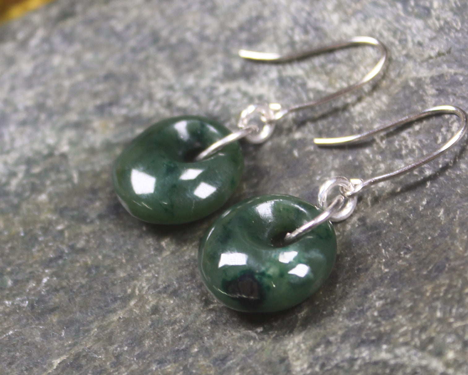 Porowhita Earrings carved from Kawakawa Pounamu - NZ Greenstone