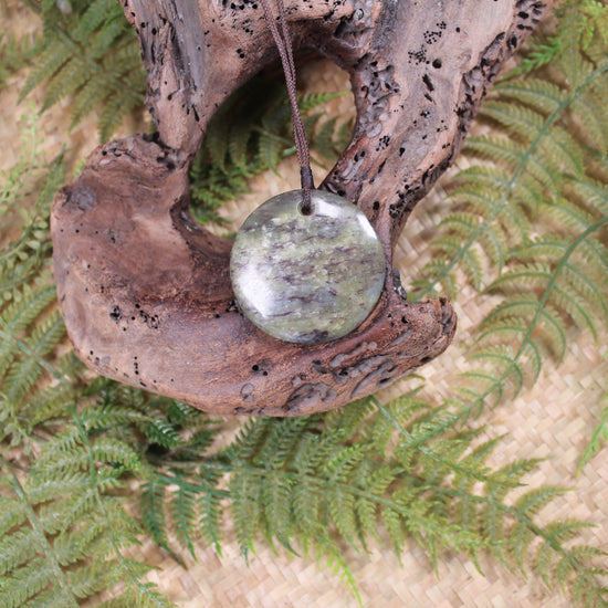 Porowhita or Pi Stone carved from Hapopo Pounamu - NZ Greenstone