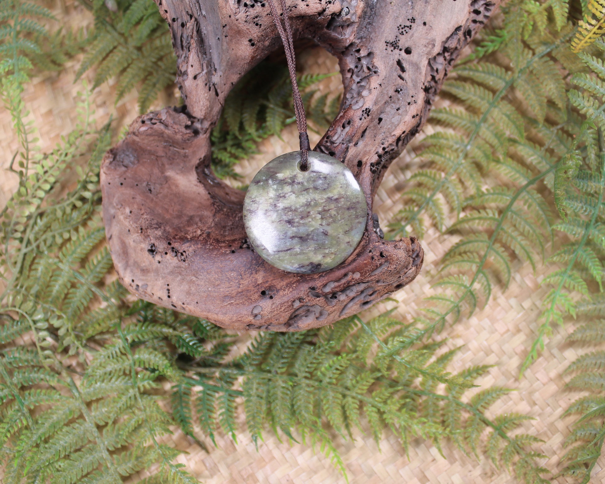 Porowhita or Pi Stone carved from Hapopo Pounamu - NZ Greenstone