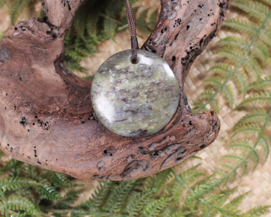 Porowhita or Pi Stone carved from Hapopo Pounamu - NZ Greenstone
