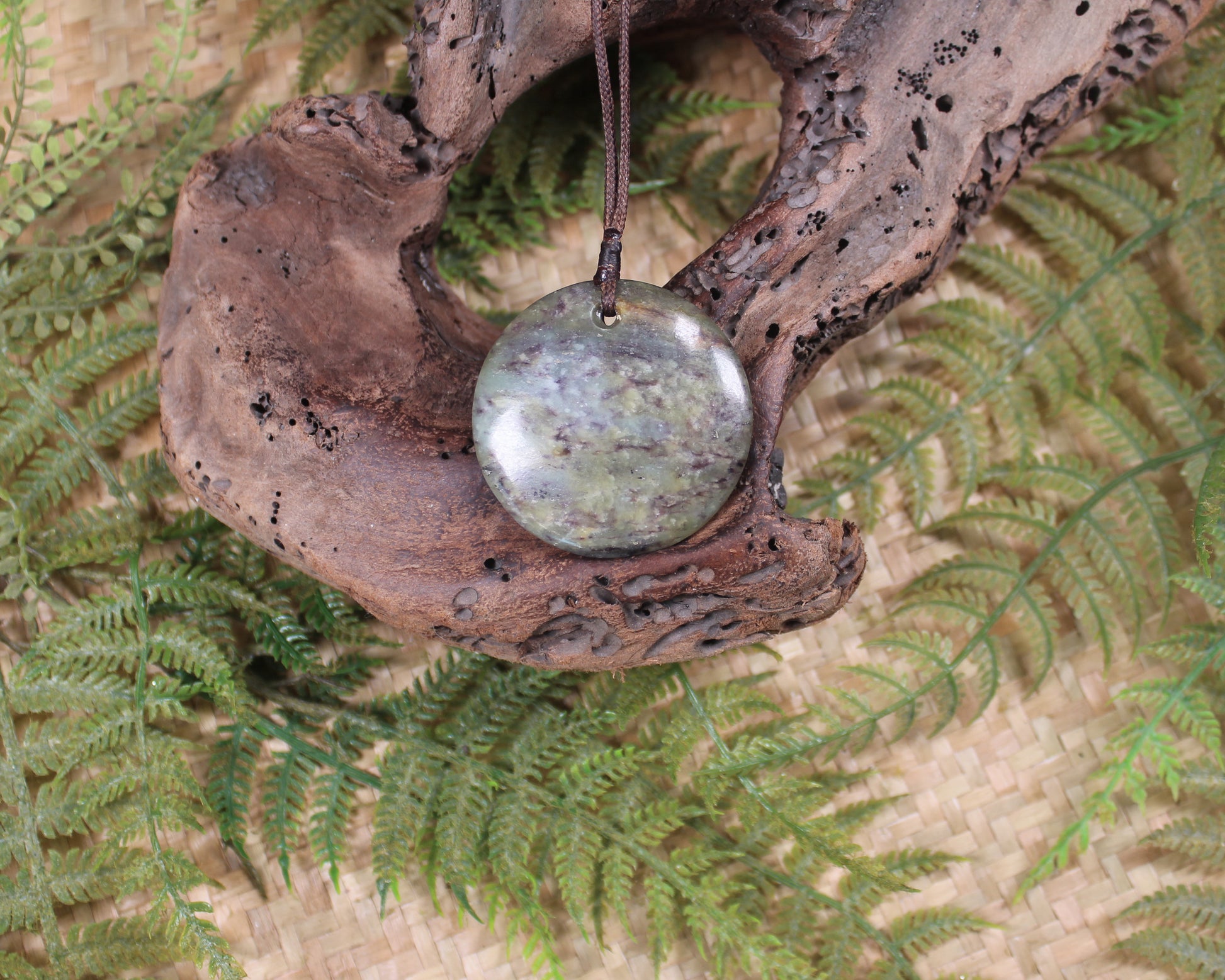 Porowhita or Pi Stone carved from Hapopo Pounamu - NZ Greenstone