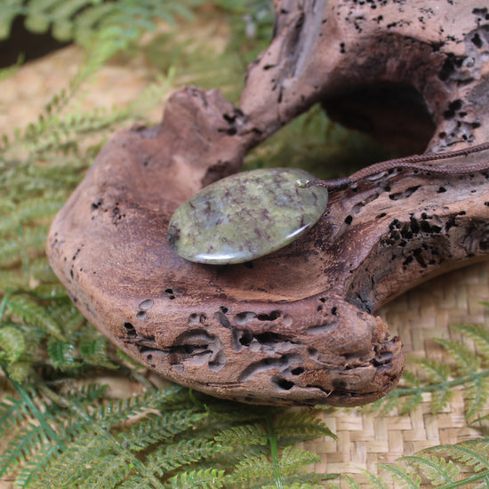 Porowhita or Pi Stone carved from Hapopo Pounamu - NZ Greenstone