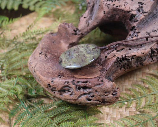 Porowhita or Pi Stone carved from Hapopo Pounamu - NZ Greenstone