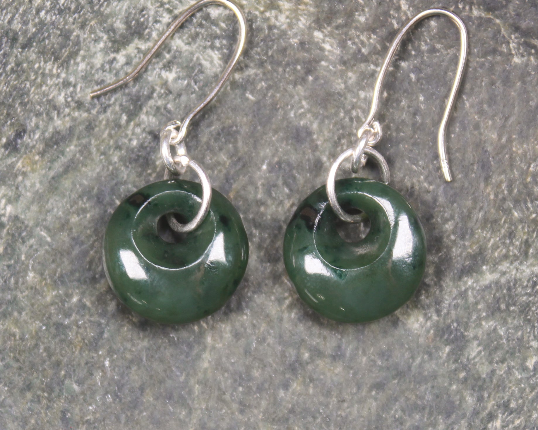 Porowhita Earrings carved from Kawakawa Pounamu - NZ Greenstone