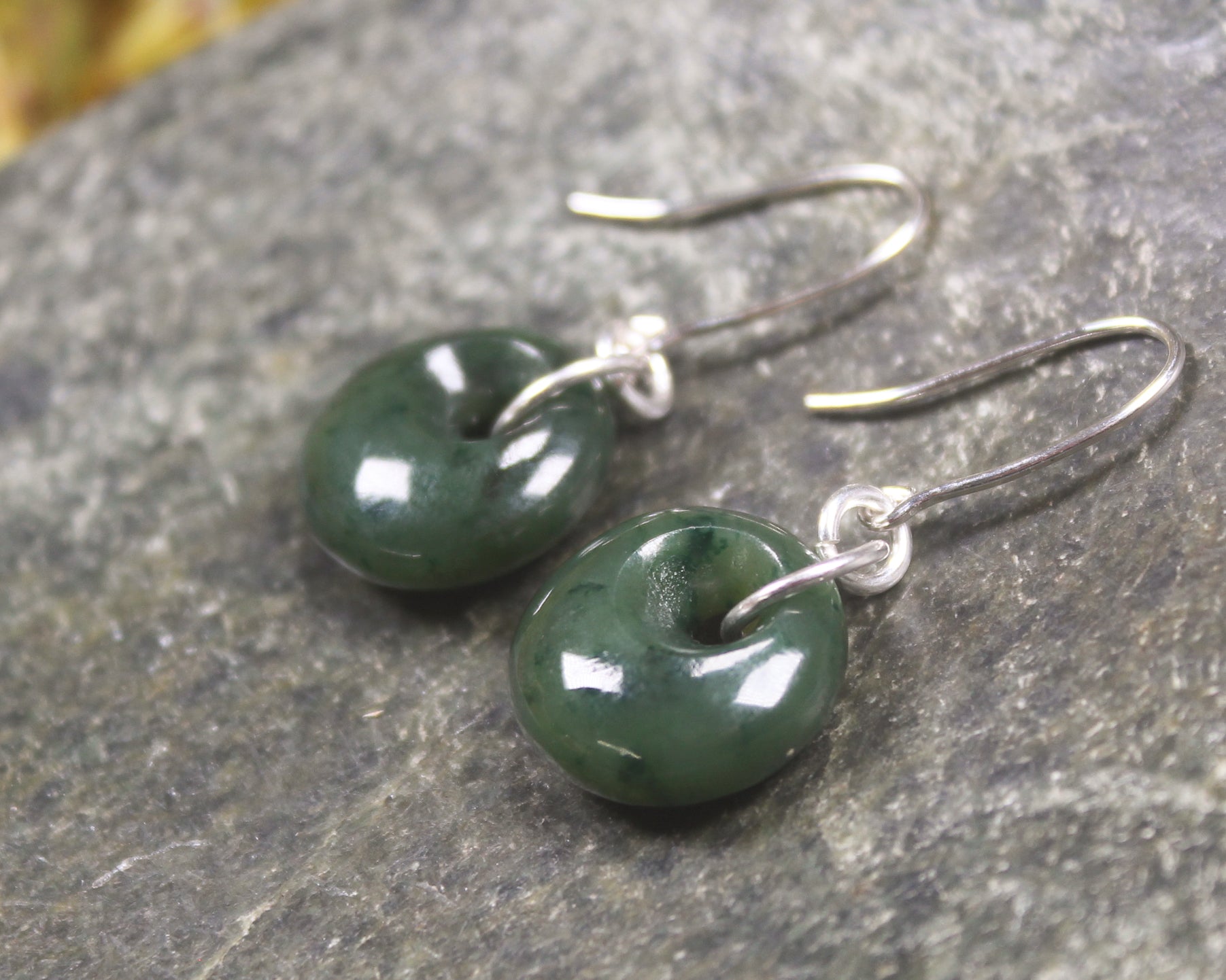 Porowhita Earrings carved from Kawakawa Pounamu - NZ Greenstone