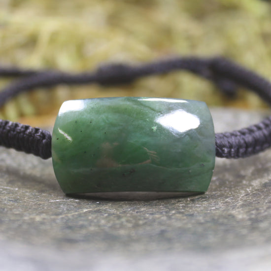 Adjustable cord bracelet with Hapopo Pounamu
